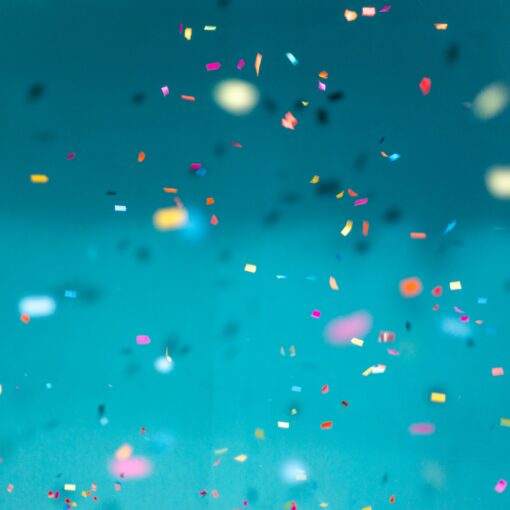 confetti over a blue background